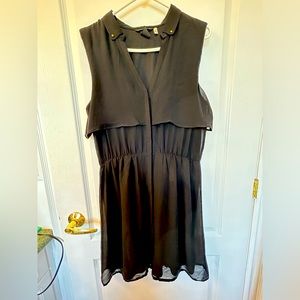 Women’s H&M knee length dress in black. S 10 Sheer with lining. Center buttons